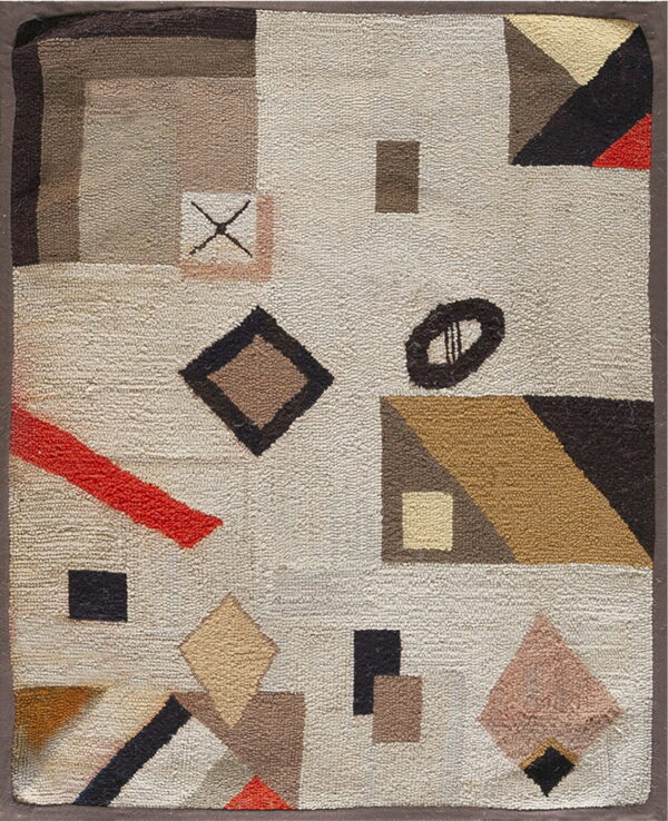 A textured low-pile rug with an abstract geometric pattern in beige, brown, black, mustard, and red accents.