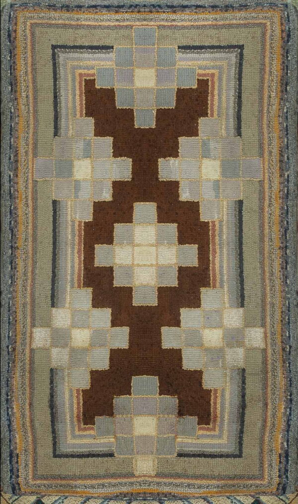 A dark brown and muted gray geometric rug with a central stepped design and multi-colored striped borders.