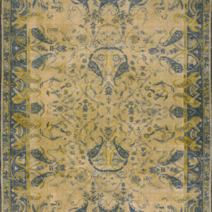 A distressed gold and teal blue rug with a traditional repeating paisley motif and wide border.