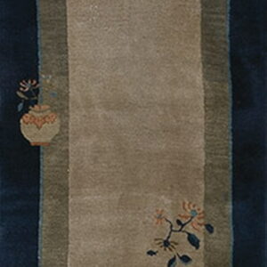 Tan and dark blue runner rug with decorative borders featuring floral, vase, and geometric symbols.