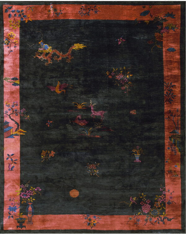 Dark rug with a red-orange border featuring dragons, deer, birds, and detailed floral motifs.