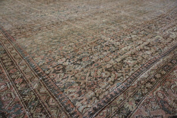 Intricate patterns on vintage persian rug.
