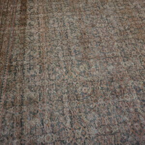 Faded intricate Persian rug design