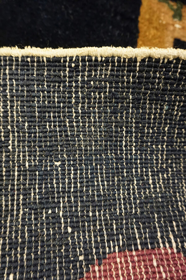 Close-up of textured blue rug