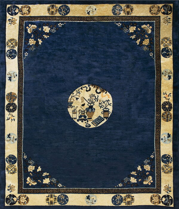 Navy blue rug with a cream border featuring circular medallions and a central pictorial circle.