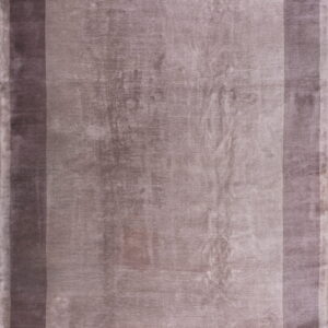 A mauve rectangular rug featuring a broad central field surrounded by darker, contrasting border bands.