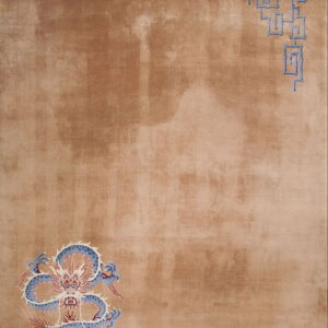 Taupe low pile rug featuring a detailed blue dragon and geometric fretwork designs in opposing corners.