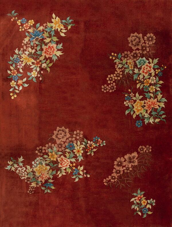 Low-pile reddish-brown rug featuring asymmetric, multicolor bouquets of detailed flowers and leaves.