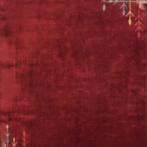 A solid red, plush rug features geometric and stylized leaf patterns in the top-right and bottom-left corners.