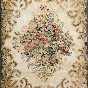 Ivory rug with a dense multicolored floral bouquet surrounded by tan scrolling acanthus leaf borders.