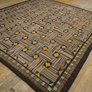 Multi-colored striped rug with a basketweave design and yellow accents lying on light wood planks.