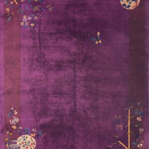 Purple rug with floral and bird motifs.