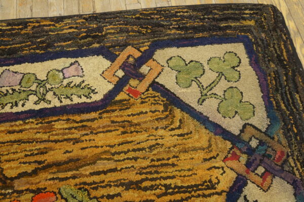 High-pile rug featuring striped yellow and black patterns bordered by cream floral designs on light wood planks.