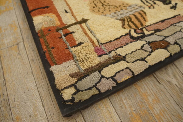 Close-up shows chunky loop pile rug in shades of rust, beige, and gray on distressed wood planks.