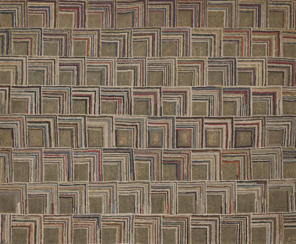 Muted green and multicolor rug with a repeating high-texture, interlocking square geometric pattern.