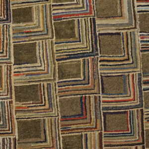 Rustic, textured rug featuring interlocking olive squares outlined in concentric stripes of brown, blue, red, and beige.