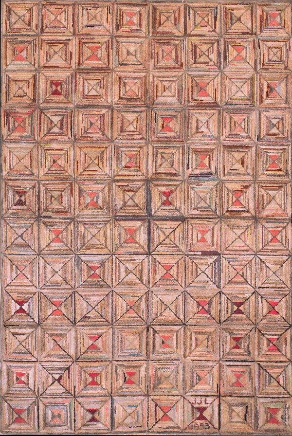 Hooked tan and brown rug with a repeating geometric log cabin pattern and the date 1973 stitched in.