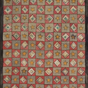 Checkerboard rug in dusty rose and gray features orange stars and multicolored concentric diamonds, surrounded by a dark border.