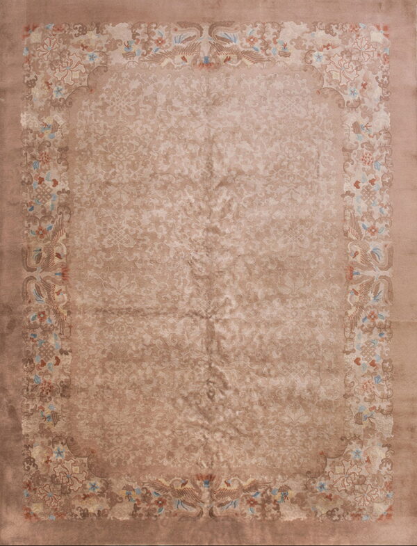 Taupe rug with subtle scrolling field pattern and ornate border featuring birds and blue florals.