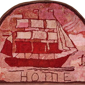 Arched hooked rug in red and pink featuring a sailing ship motif and the word HOME.