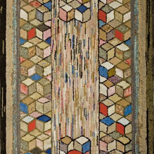 Textured rug displaying multicolored tumbler block patterns bordering a central vertical section of thin stripes.