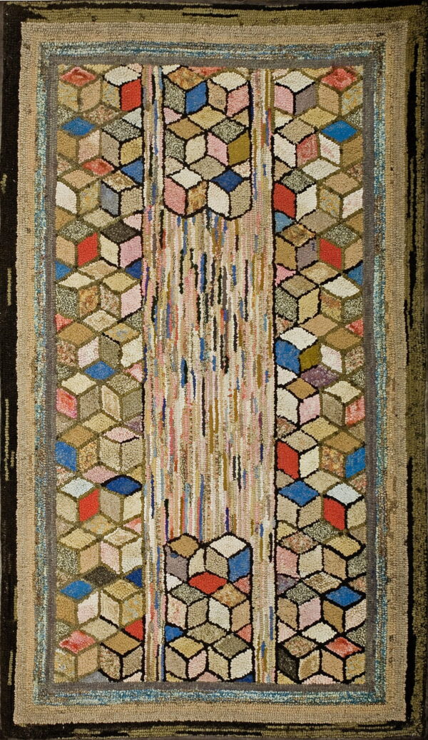 Textured rug displaying multicolored tumbler block patterns bordering a central vertical section of thin stripes.