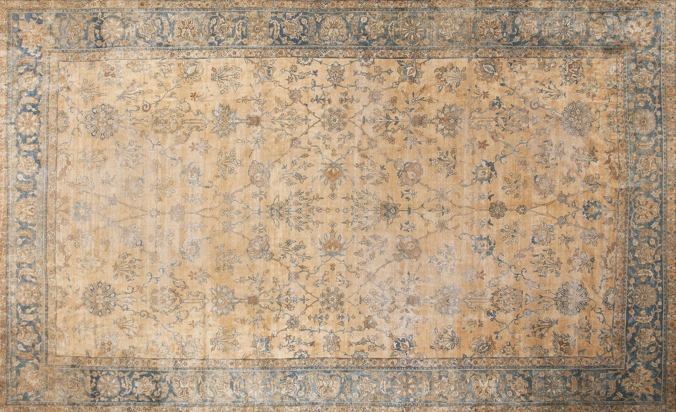 Full view of an antique, hand-knotted persian-style area rug with complex geometric patterns - by rugs on net
