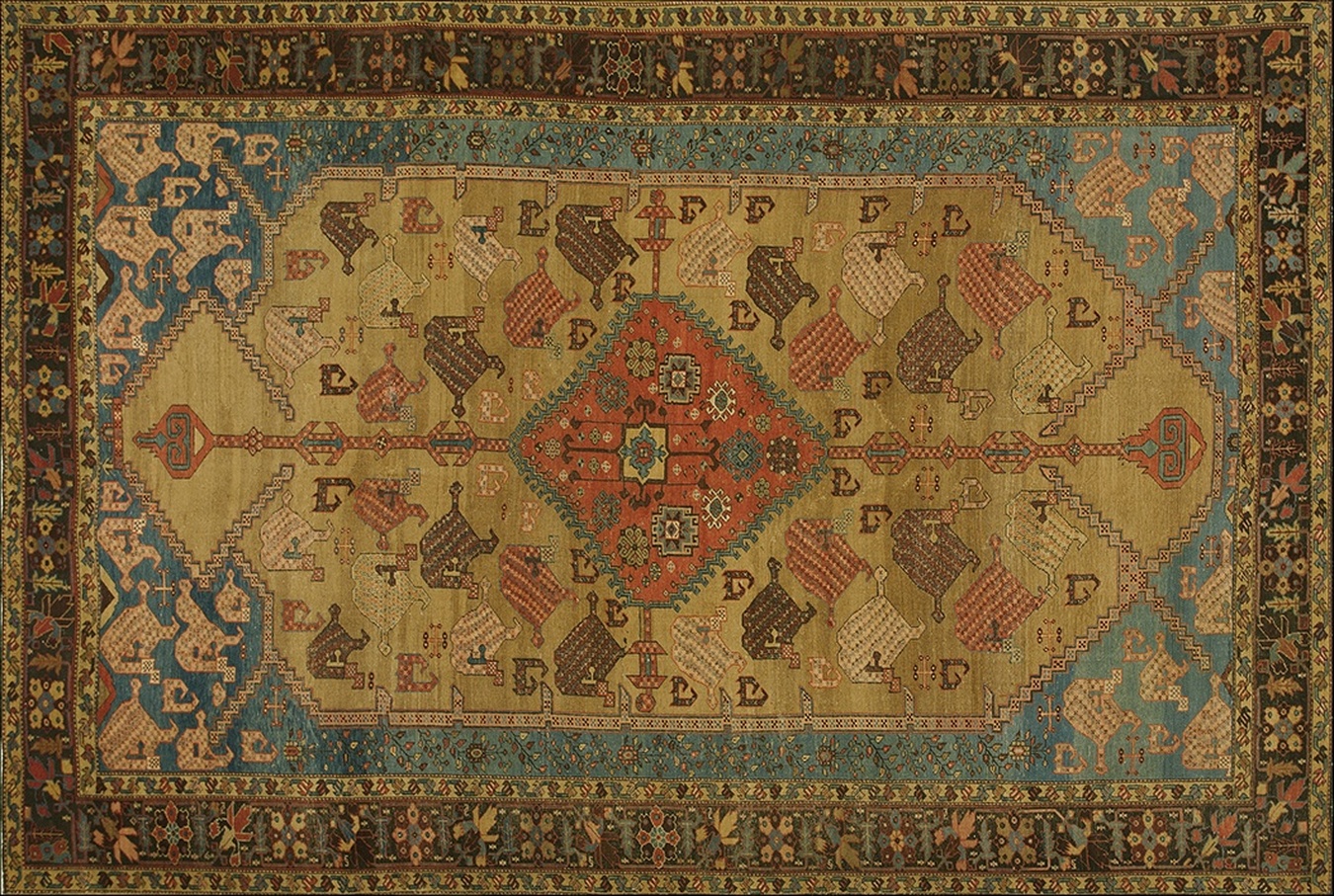 Full shot of an antique hand-knotted rug displaying traditional animal and floral patterns - by rugs on net
