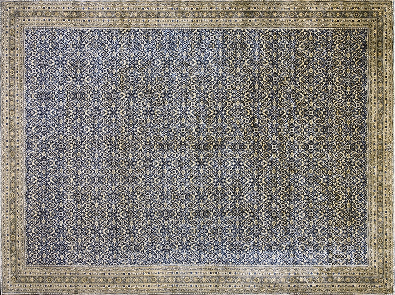 Antique hand-knotted persian rug with faded red and blue medallion design, showing distressed vintage texture - by rugs on net