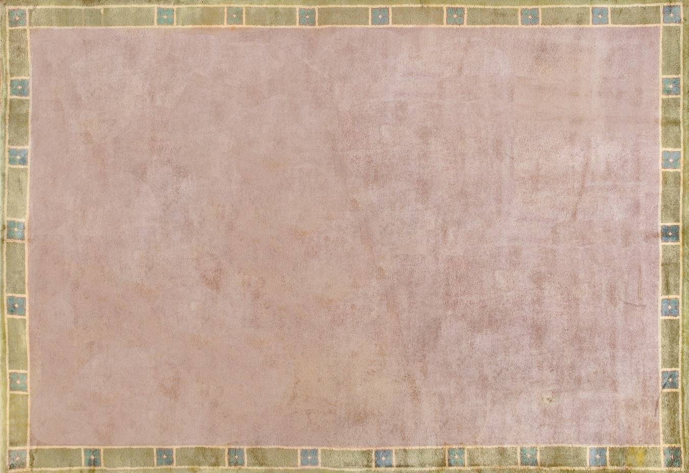 Vintage low pile art rug featuring abstract floral medallions in muted earth tones - by rugs on net