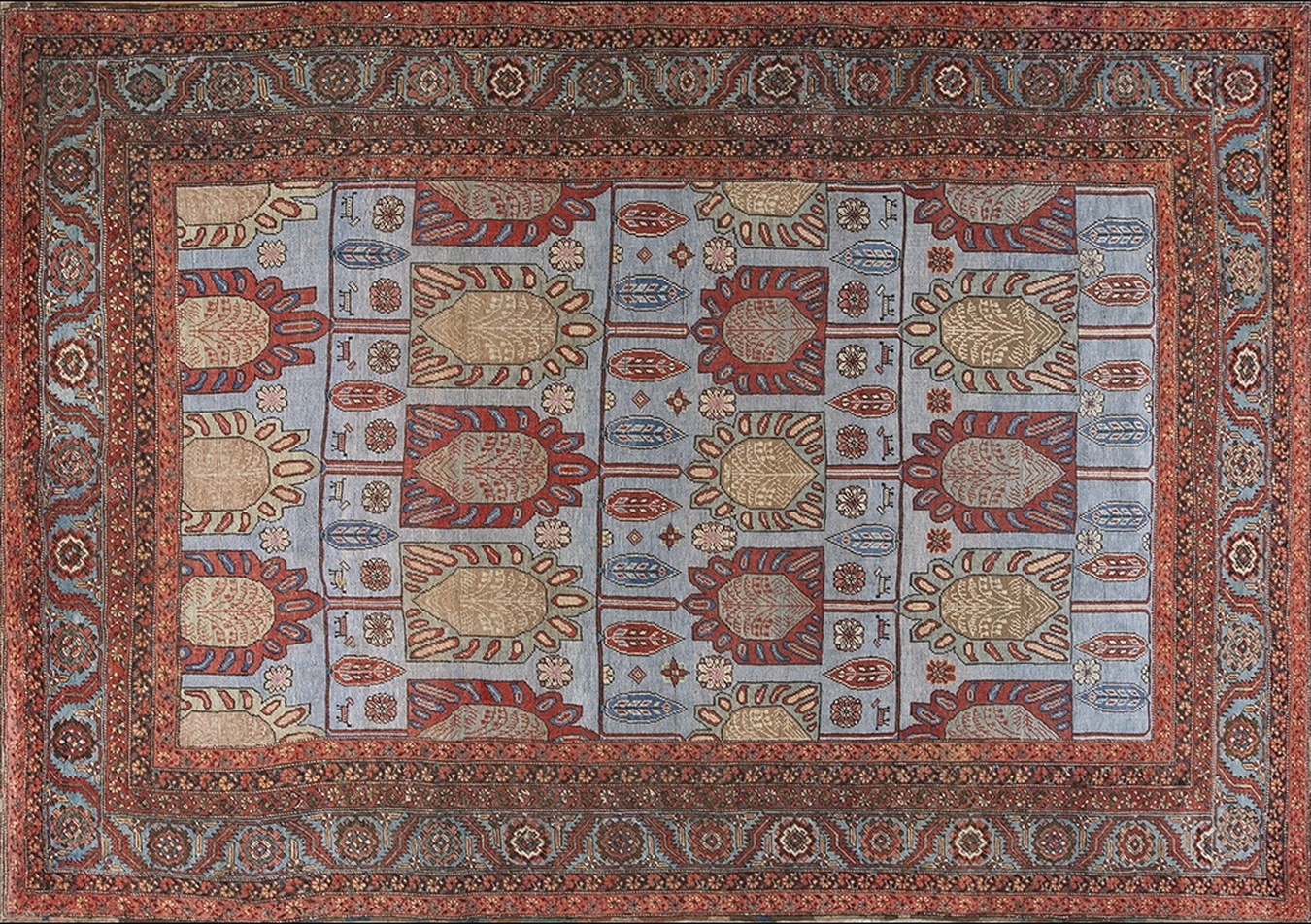 Large antique bakshaish persian rug displaying an all-over geometric pattern in red, blue, and brown - by rugs on net