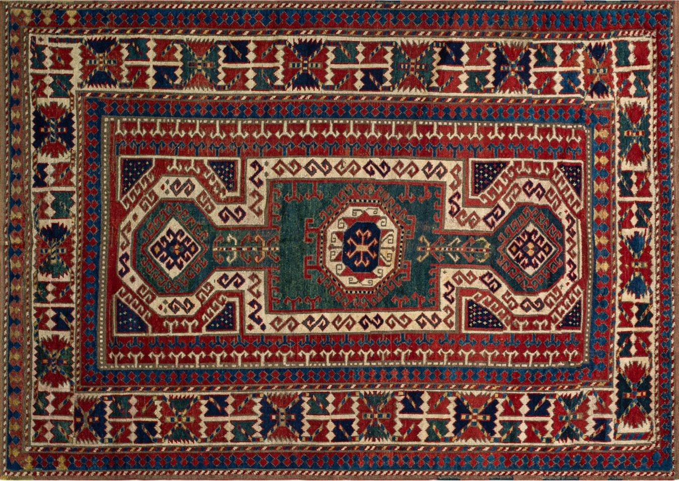 Full view of the antique 1875 caucasian russia rug with rich coral and navy geometric design - by rugs on net