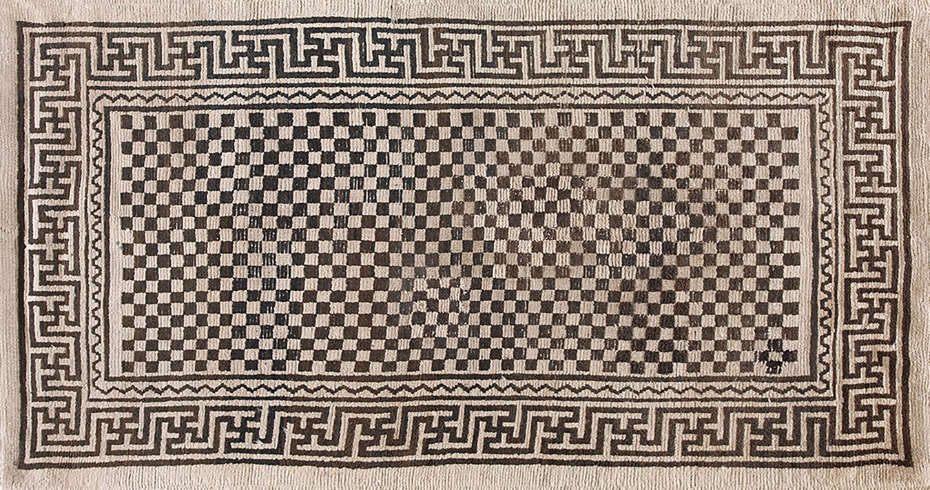 Close-up detail of an antique ivory chinese tibetan 1930s wool rug pattern - by rugs on net