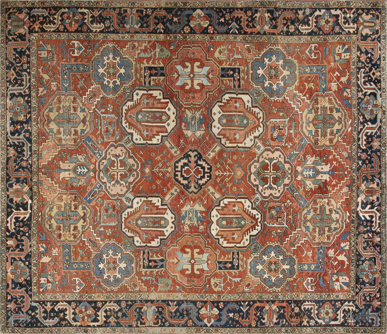 Room size antique heriz rug featuring wool pile and bold coral, blue, and cream geometric patterns - by rugs on net