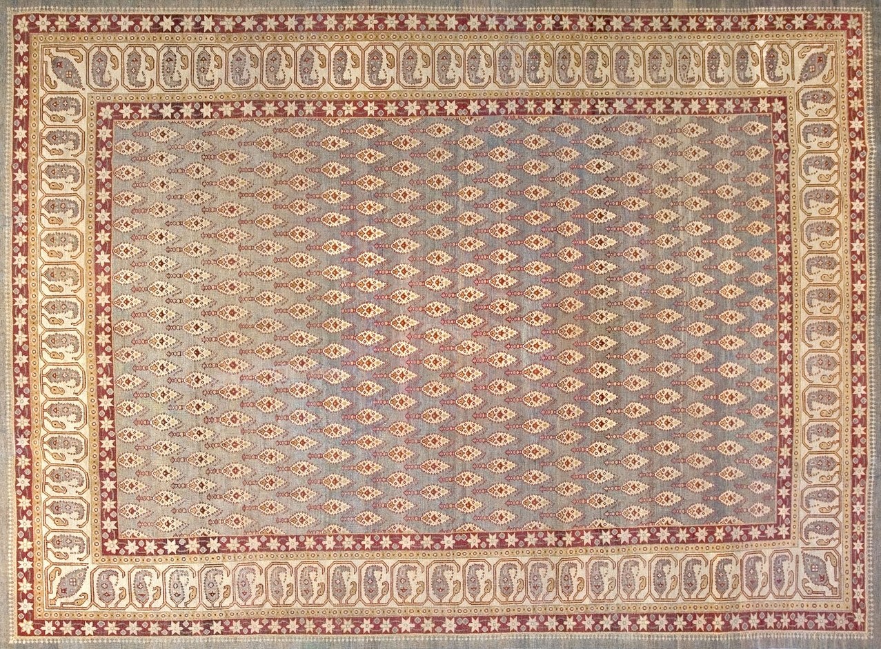 Hand-knotted antique area rug featuring a traditional medallion pattern in distressed colors - by rugs on net