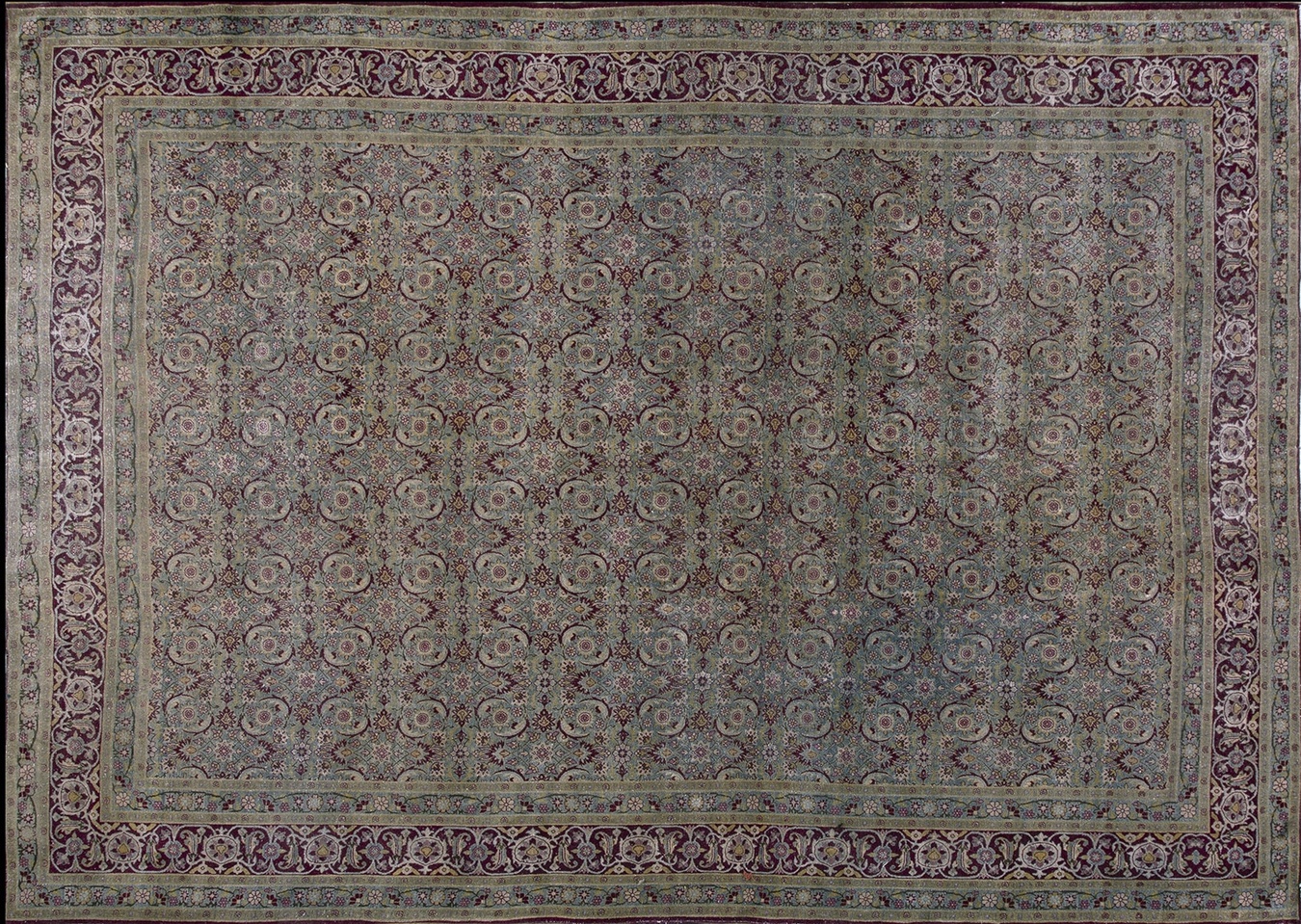 Antique room-size kirman wool rug displayed, showing detailed green and ivory floral patterns - by rugs on net