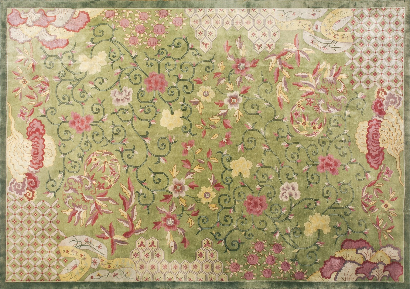 View of a large antique green wool hand-knotted pile rug featuring traditional patterns - green rug colors by rugs on net