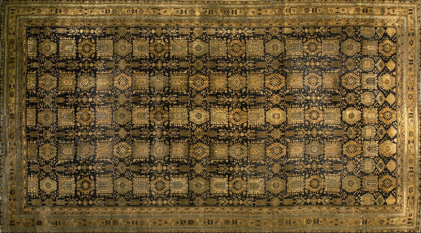 Oversized antique agra indian knotted rug featuring detailed traditional floral motifs and a complex border - by rugs on net