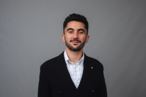 Headshot of emanuel rahmanan - by rugs on net