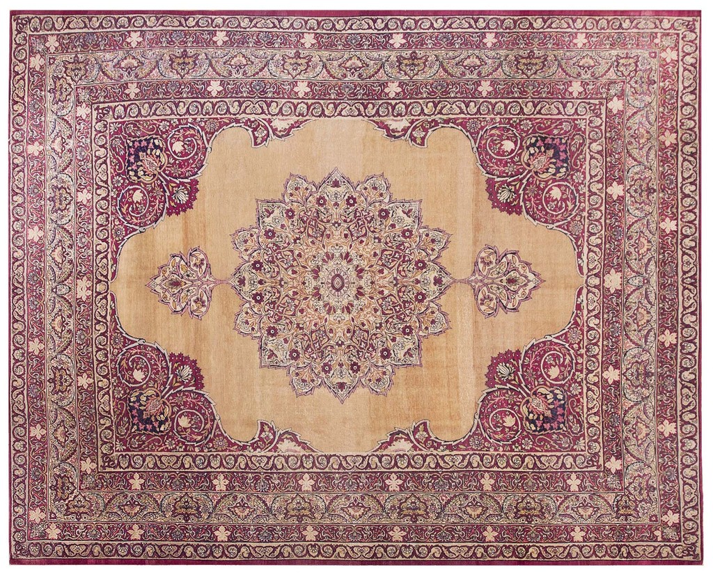 An antique kerman room size rug with a large central medallion and elaborate burgundy and tan floral patterns by rugs on net.