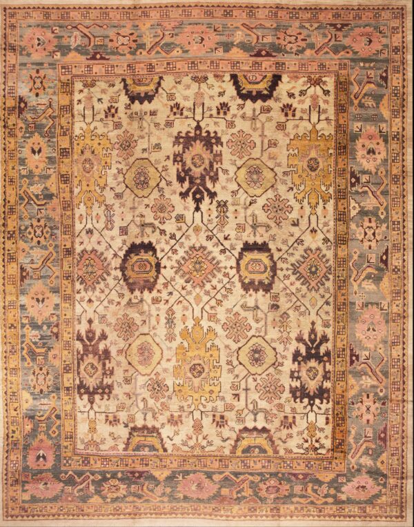Large ivory background allover tribal design antique turkish oushak carpet