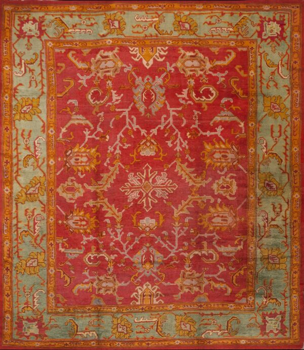 Red background with jewel tones tribal allover design antique turkish oushak rug