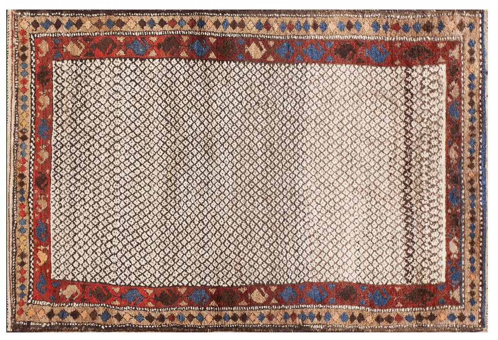 An overhead view of an antique persian shahsavan tribal rug featuring a light field with a dense dark diamond lattice pattern, surrounded by a dark red border with blue and tan geometric accents by rugs on net.