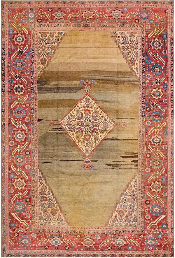 Earthy camel color antique tribal geometric herati medallion design antique persian bakshaish rug by rugs on net