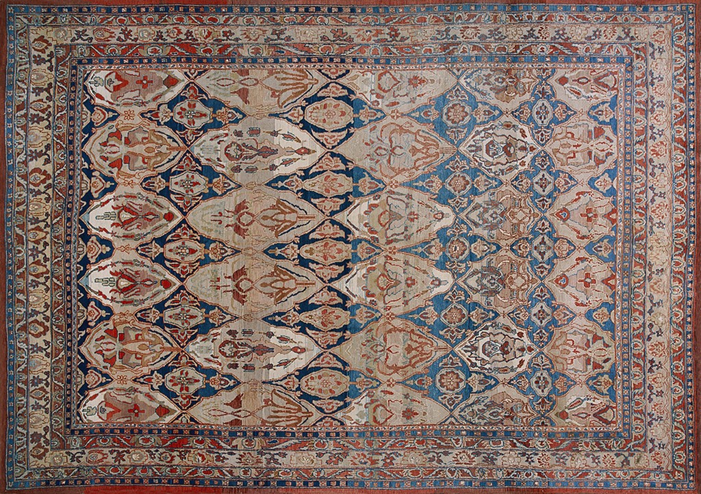 A rectangular vintage mahal iranian rug displaying a repeating diamond lattice pattern with stylized floral elements in faded beige, deep navy blue, and russet red, framed by a detailed border by rugs on net.