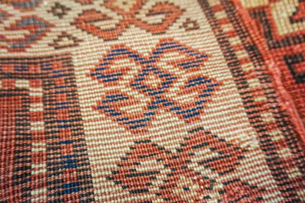 Close-up of the geometric pattern in the tribal rug by rugs on net. By rugs on net