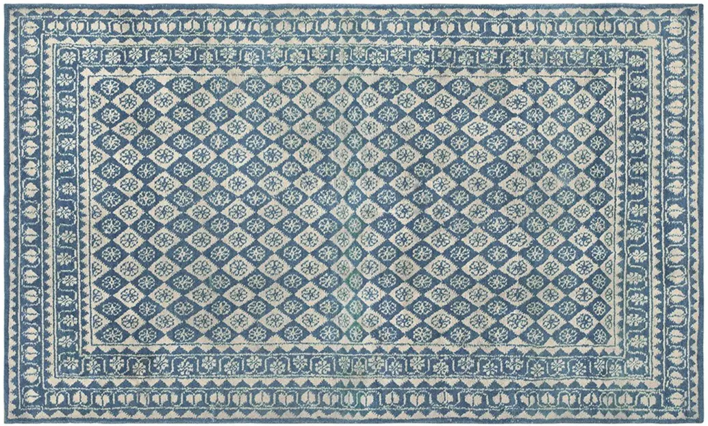 Blue and cream rug with a diamond-grid floral pattern and detailed decorative borders by rugs on net
