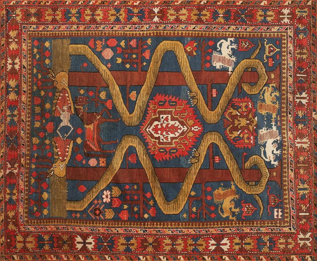 Tribal rug with blue background, mustard yellow dragon motifs, central red medallion, and intricate geometric borders by rugs on net