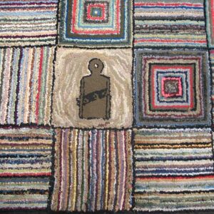 Close-up of a colorful rag rug with a central silhouette figure, by Rugs On Net