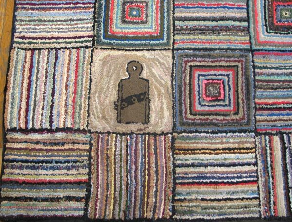 Close-up of a colorful rag rug with a central silhouette figure, by rugs on net